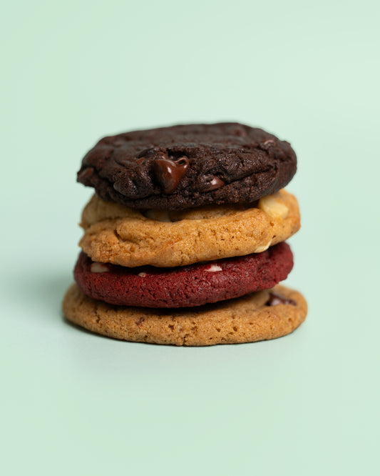 Customizable cookie box featuring 12 freshly baked cookies—choose 4 flavors with 3 cookies each for a personalized sweet treat.